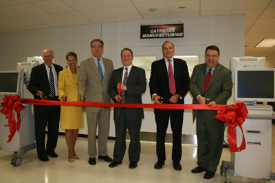 Ribbon cutting ceremony for InfraReDx’s newly expanded clean room for coronary catheter manufacturing in Burlington