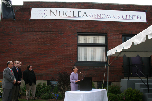 Dr. Susan Windham-Bannister speaks at the grand opening of Nuclea Biotechnologies’ Genomics Center in Pittsfield. Behind her from left to right are Pittsfield Mayor James Ruberto, State Senator Benjamin B. Downing, Peter Abair, Director of Economic Development at MassBio, and Patrick J. Muraca, President and CEO of Nuclea Biotechnologies.