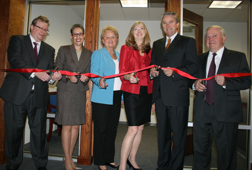 Federal, state and local officials gathered on Thursday to celebrate the opening of the new Biotech InnoVenture Center at 100 Cummings Center in Beverly. The new facility, funded in part by a grant from the Massachusetts Life Sciences Center, will provide incubator space for early-stage life sciences companies. Pictured from left to right are Harry McCoy, President & CEO of Thorne Diagnostics and Chairman of North Shore InnoVentures, Massachusetts Life Sciences Center President & CEO Susan Windham-Bannister, State Representative Mary Grant, North Shore InnoVentures President Martha Farmer, Congressman John Tierney, and Beverly Mayor William Scanlon.