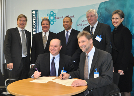 Governor Deval Patrick, Dr. Windham-Bannister and UMass President-elect Robert Caret witness the signing of an agreement between the University of Massachusetts Stem Cell Bank & Registry and the UK Stem Cell Bank. (Photo credit: Kim Haberlin, EOHED)
