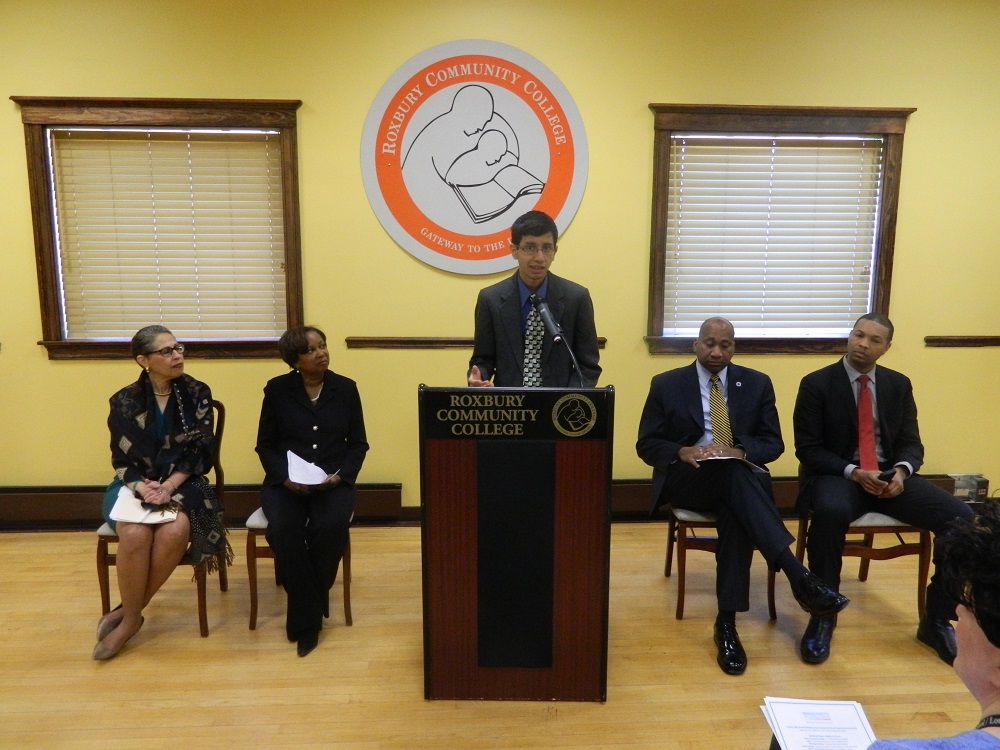 Jorge Bonilla, the Student Trustee at Roxbury Community College, participates in the announcement of the Massachusetts Life Sciences Center’s capital awards in the greater Boston region, including a $3 million grant for the construction of new training facilities at Roxbury Community College. Also pictured from left to right are: MLSC President & CEO Dr. Susan Windham-Bannister, Ph.D., President of RCC Dr. Valerie Roberson, State Representative Russell Holmes and City of Boston Chief of Education Turahn Dorsey.