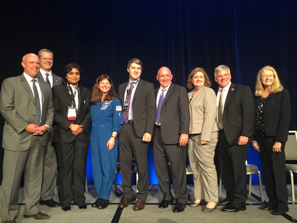 (From left to right) Interim CEO Mike Kennealy, Governor Charlie Baker, Chairman and CEO of Nanobiosym Dr. Anita Goel, NASA Astronaut Cady Coleman, Co-founder and CEO of Zaiput Flow Technologies Dr. Andrea Adamo, Head of the ISS for NASA Mike Suffredini, Chief Scientist at the ISS Station for NASA, Former NASA Astronaut and Executive Director of CASIS Gregory Johnson and President of the American Astronautical Society Lyn D. Wigbels participate in the the announcement of the Galactic Grant Competition winners at the ISS R&D Conference in Boston.